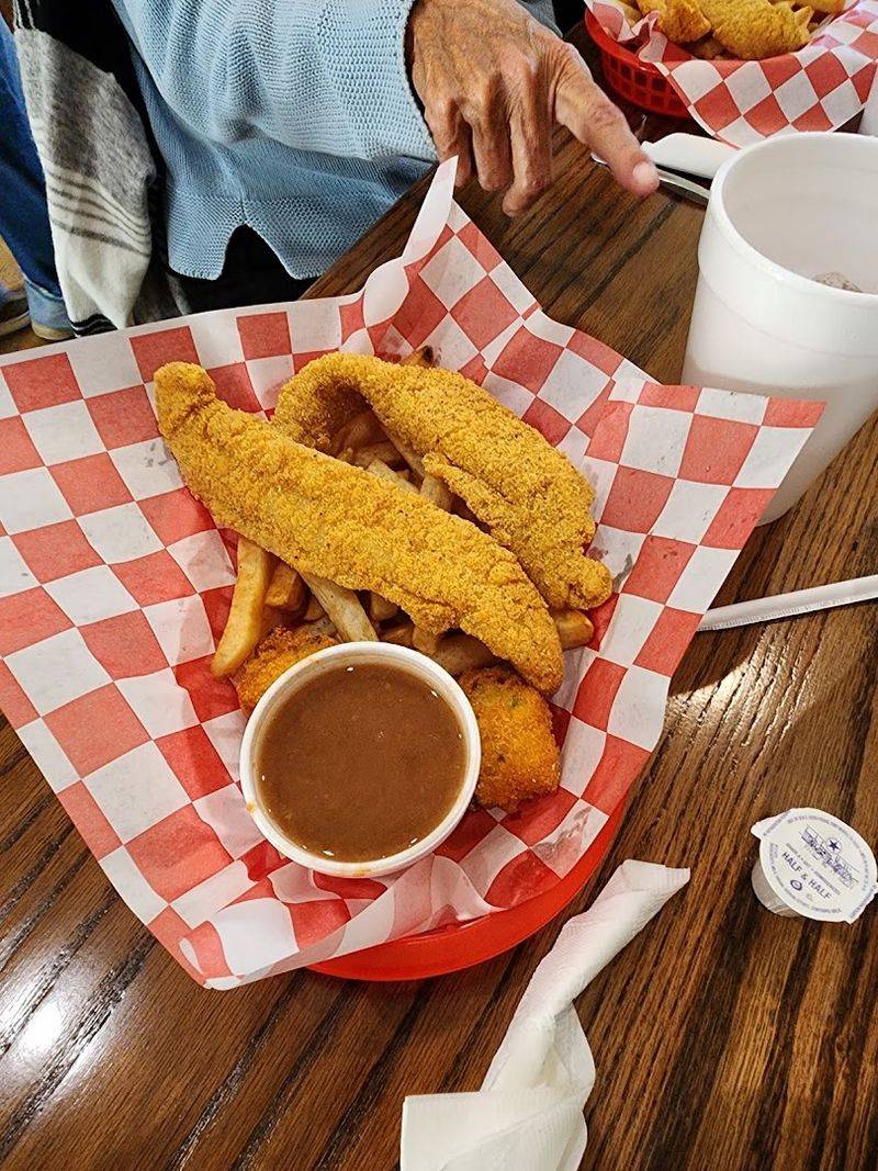 Fresh Fried Fish Plates With Hush Puppies on the Side Fresh Fried Fish Plates With Hush Puppies on the Side