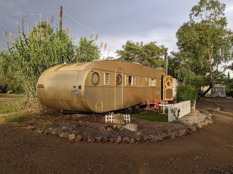 Sunset Silhouettes Against Quirky Desert Decor