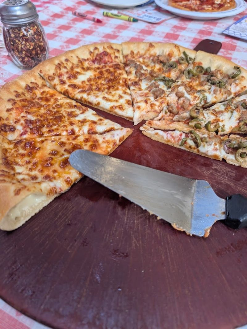 Red And White Checked Tablecloths On Every Table