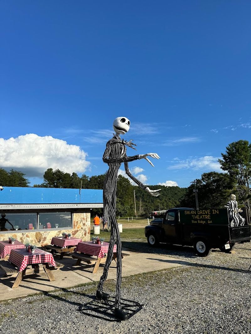 Cornhole Games And Picnic Tables At The Screen Base
