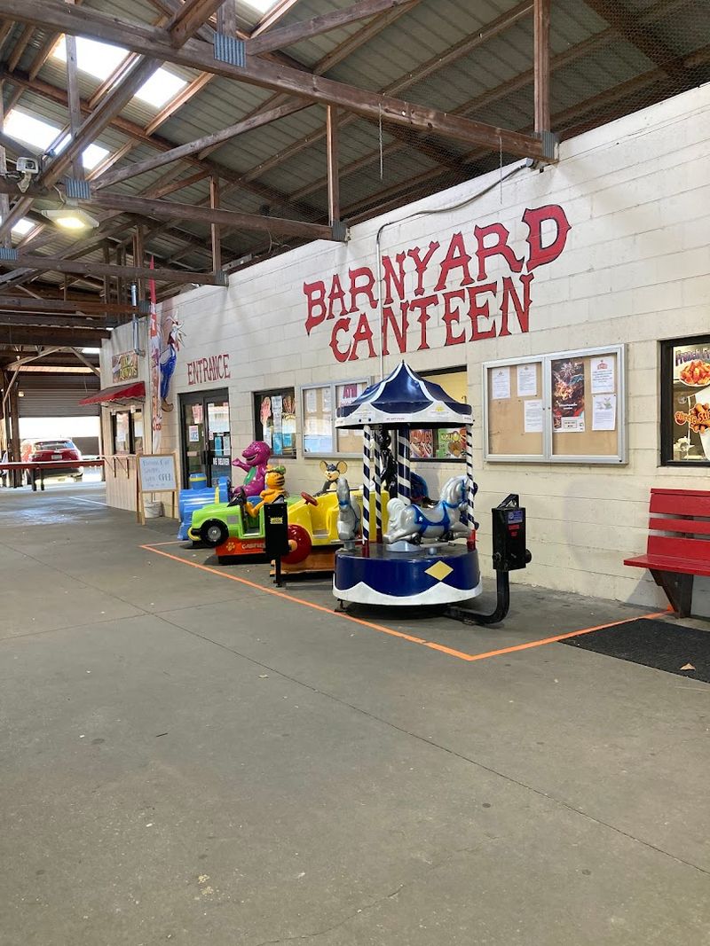 A Snack Bar With Burgers And Sweet Funnel Cakes