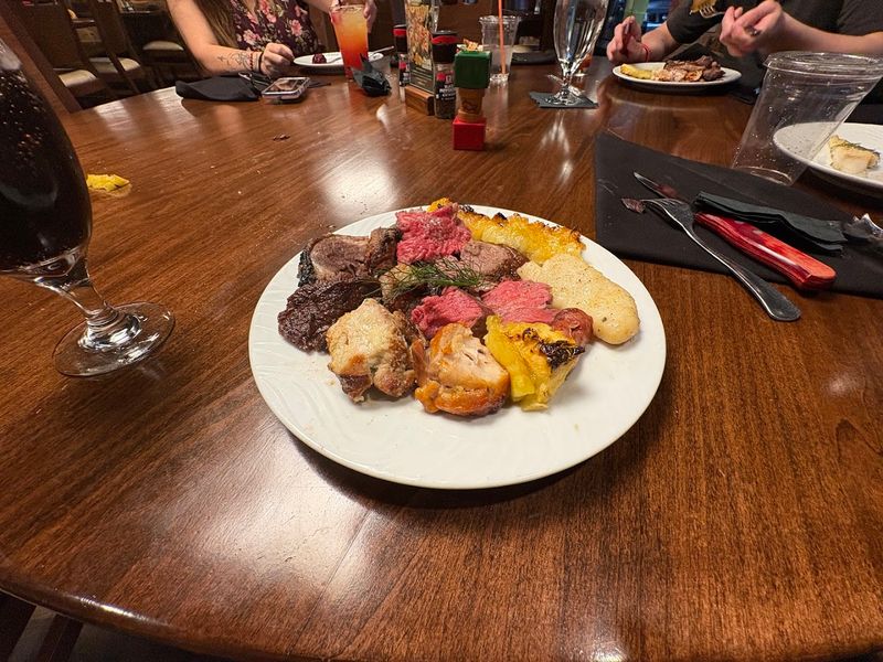 Rotisserie-Grilled Meats Carved Tableside by Gauchos