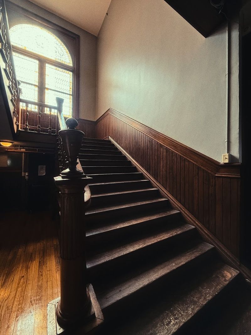 The Lady in Blue on the Stairwell