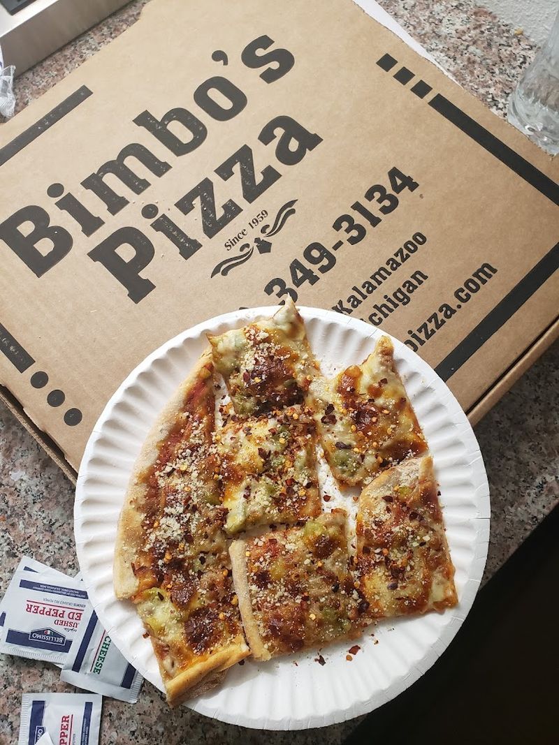 A 14 Inch Super Thin Crust Cut Into Squares