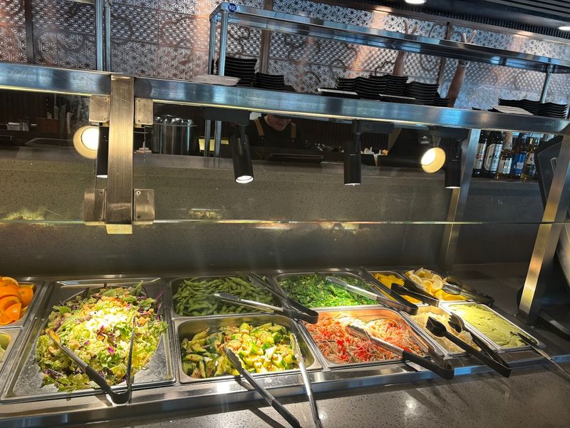 The Buffet Bar Keeps Hunger at Bay Between Orders