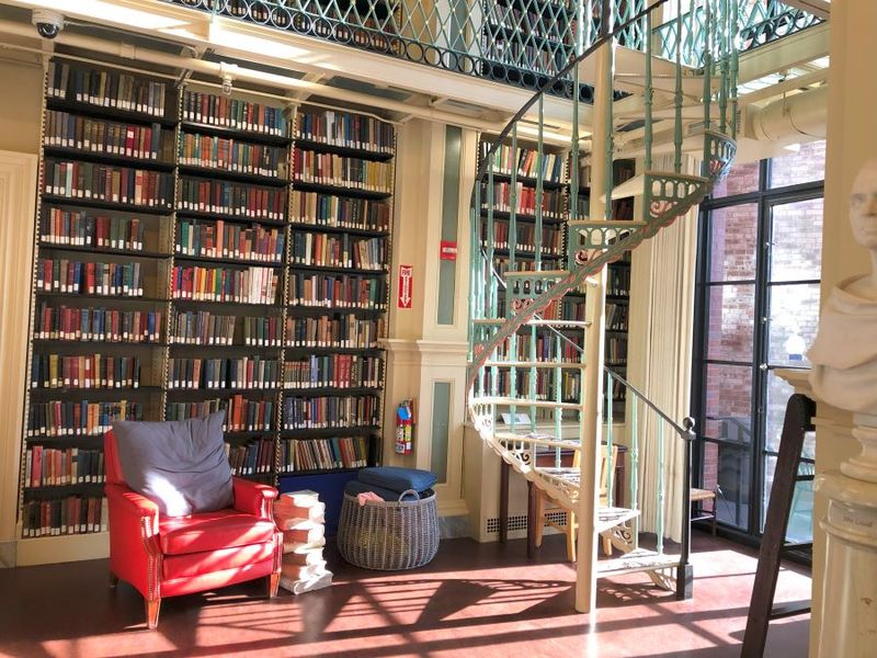 A Cozy Leather Chair Waiting In A Sunlit Corner