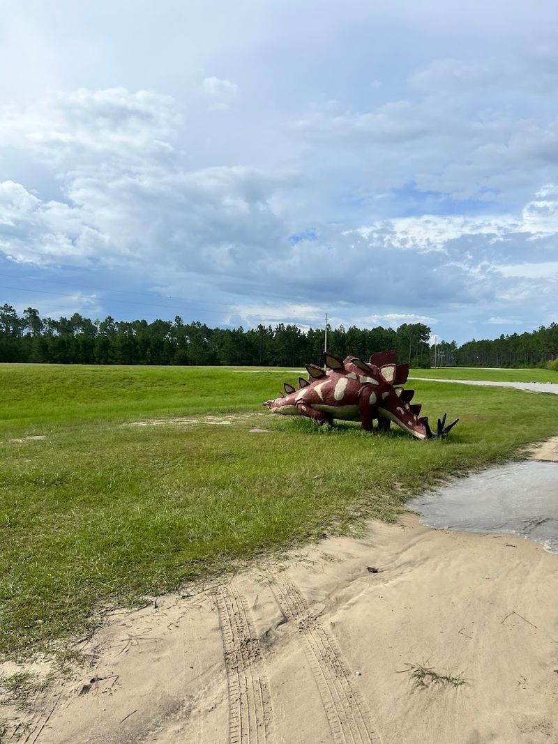 Life Sized Dinosaurs Lurk Just Down The Road