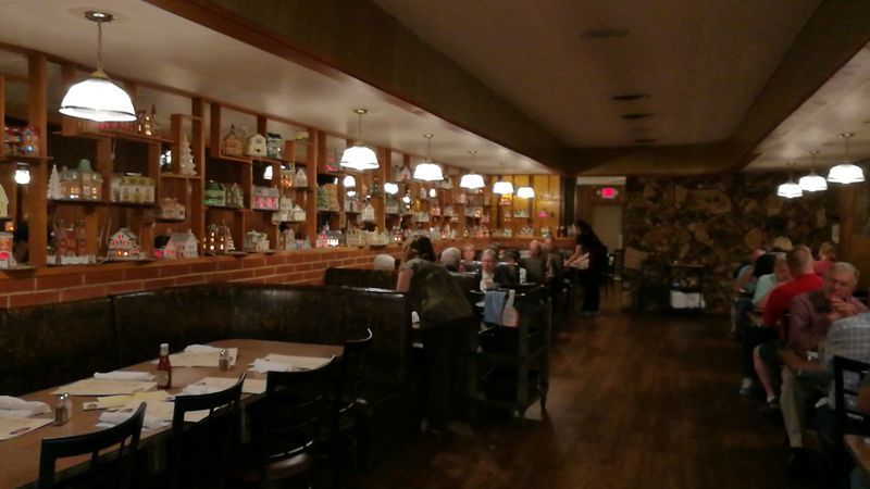White Tablecloths And Dark Wood Furniture