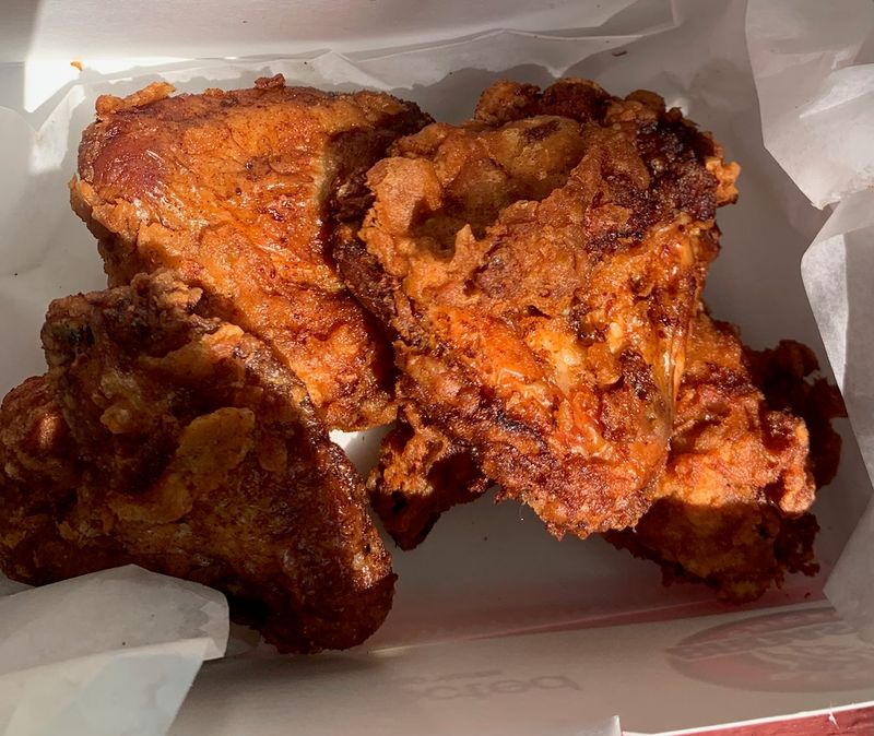 The Unique Sizzle Of Broasted Chicken Being Made