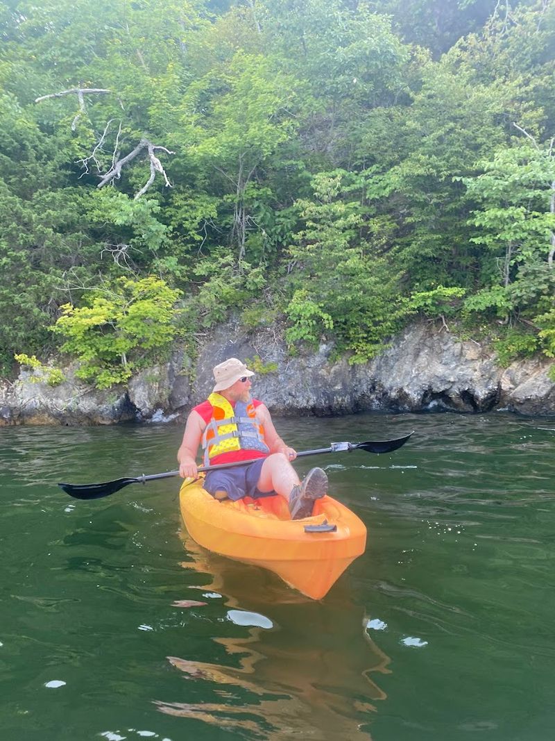 Kayaking Into Quiet Coves and Rock Formation Country