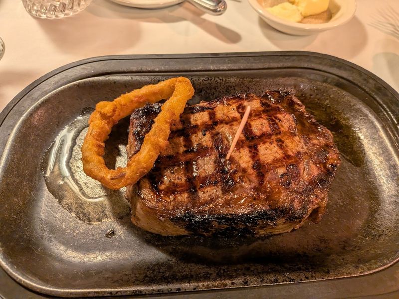 A Giant Sizzling Cut That Barely Fits The Plate