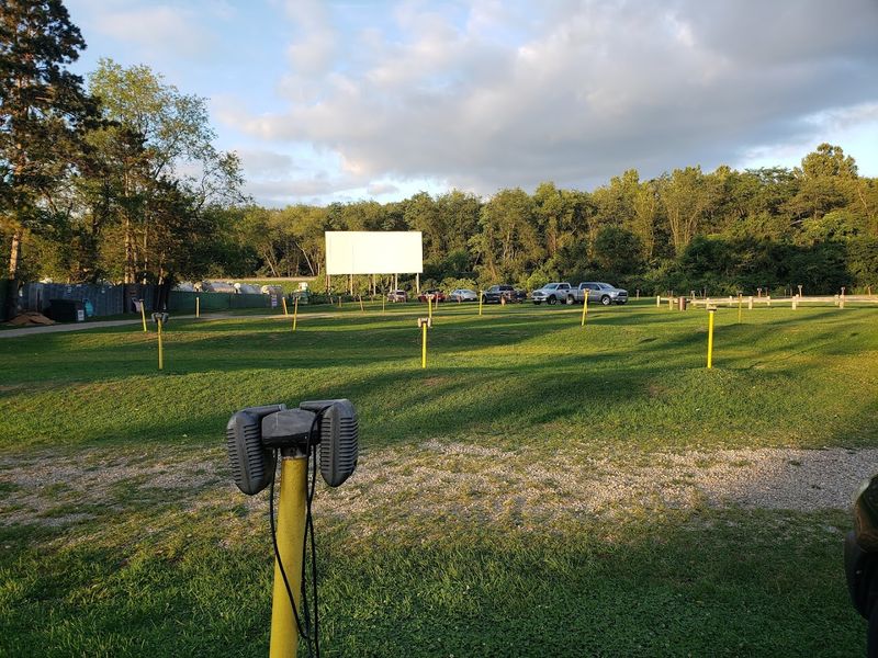 Speaker Posts Standing Quietly Between Every Vehicle