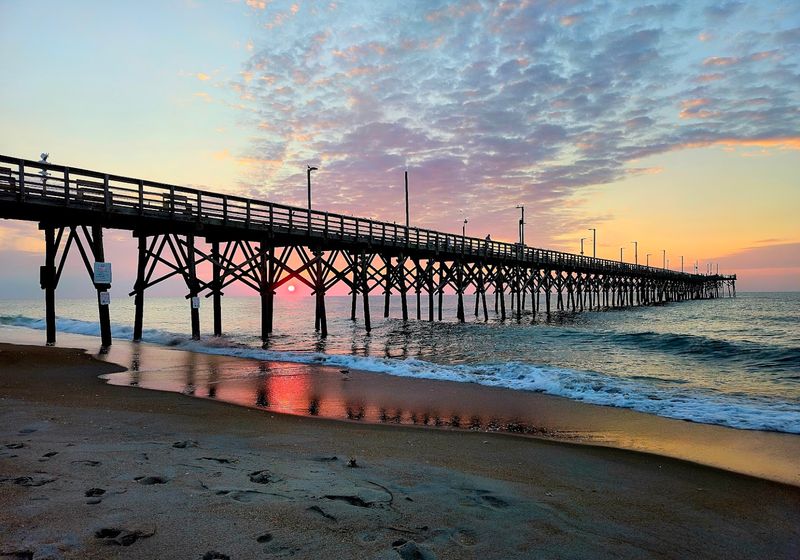 A Charming Pier Over The Gentle Surf