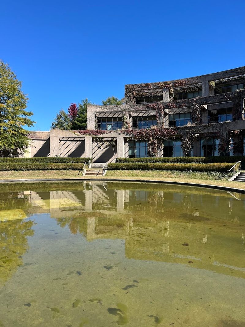 The Reflecting Pool and Brutalist Beauty Outside