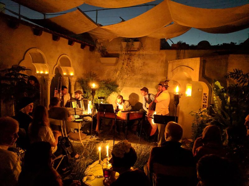 Wood Paneling And Velvet Curtains Throughout