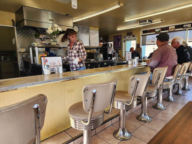 A Vintage Counter With Classic Swivel Stools