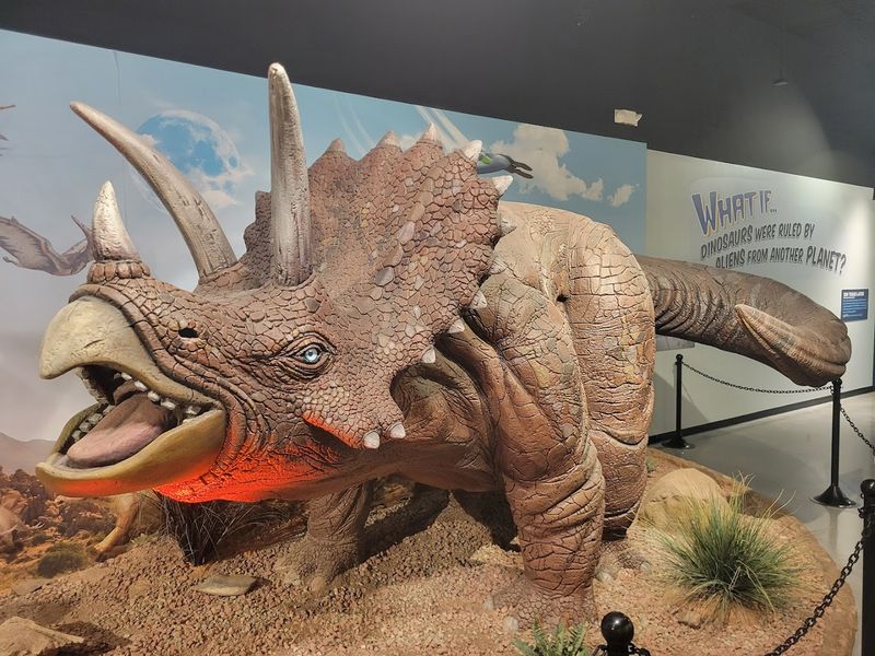 Three Long Sheds Painted In Stripes Of Primary Colors