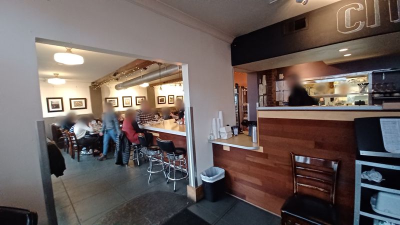 The Atmosphere Inside: Cozy Booths and Counter Seats