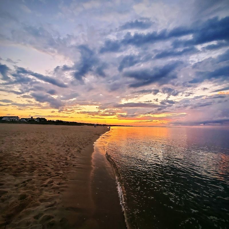 Soft Sand And Gentle Waves Perfect For A Lazy Day
