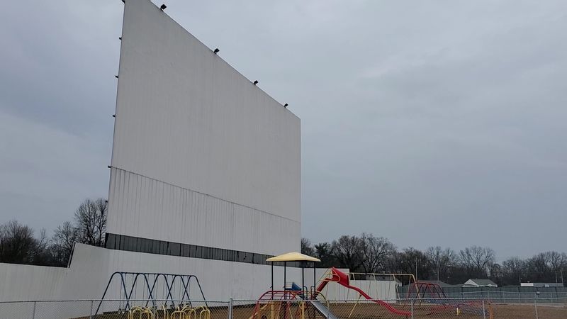 Fenced Playground Equipment At The Base Of The Main Screen