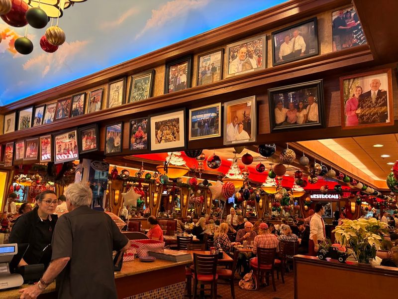 Celebrity Photos And Signed Posters Covering The Walls