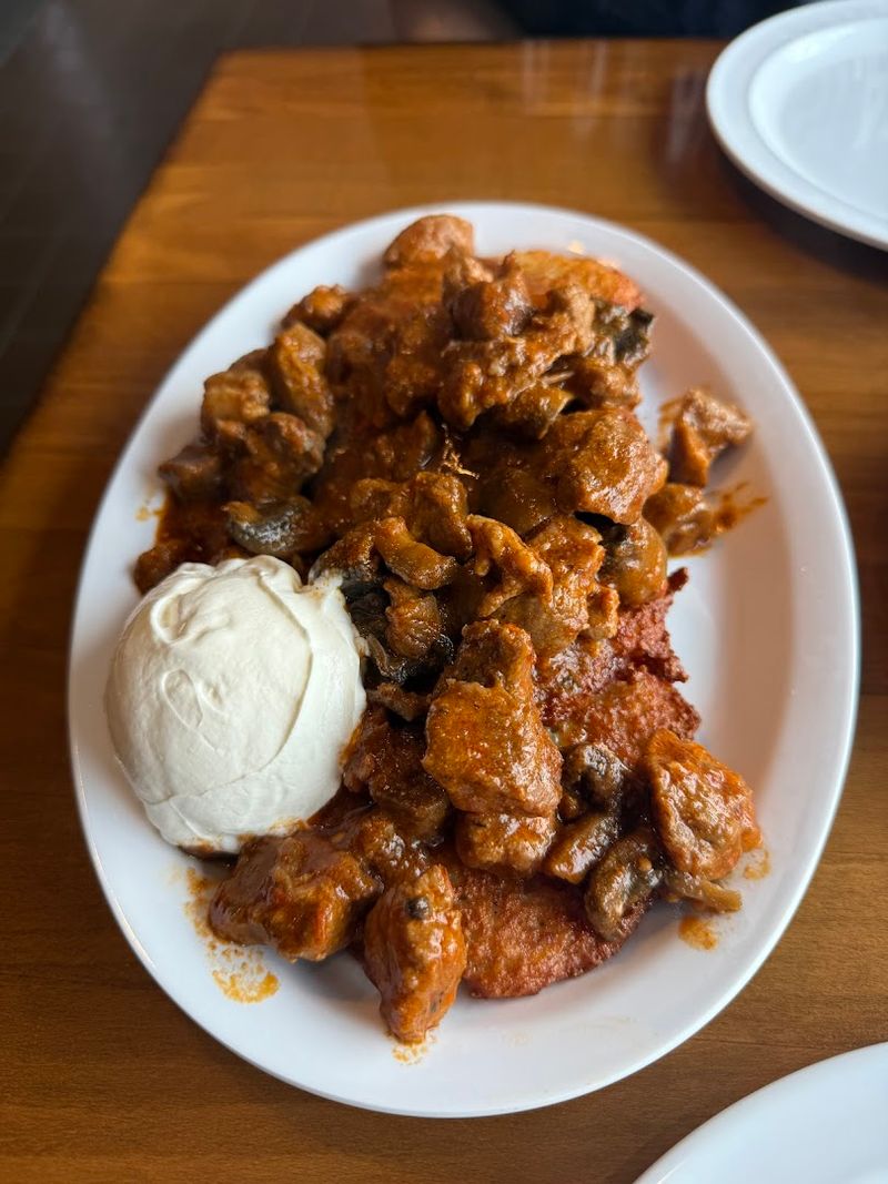 Goulash Over Potato Pancakes Is a Must-Order