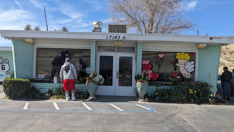 Colorful Flower Planters Flanking The Entrance