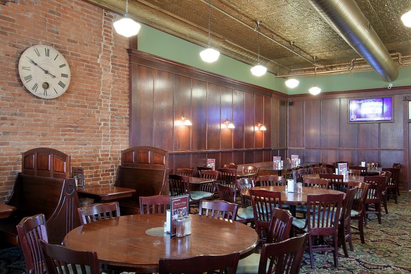 Exposed Brick Walls And A Stamped Tin Ceiling