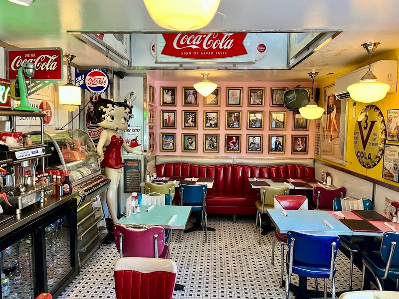 Red Vinyl Seats And The Hum Of A Late Night Crowd