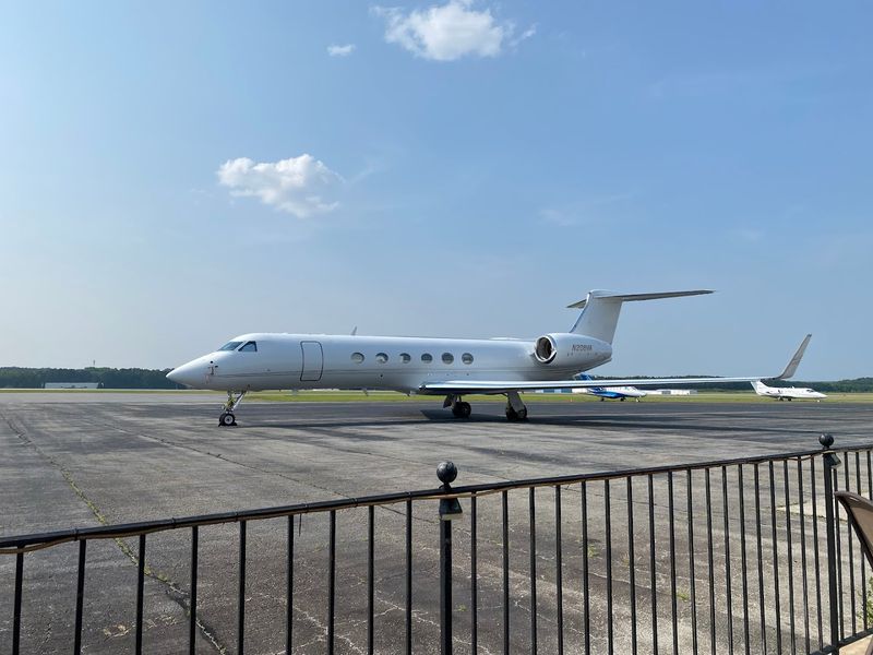 Pilots Taxiing Up And Parking Their Planes Right Outside