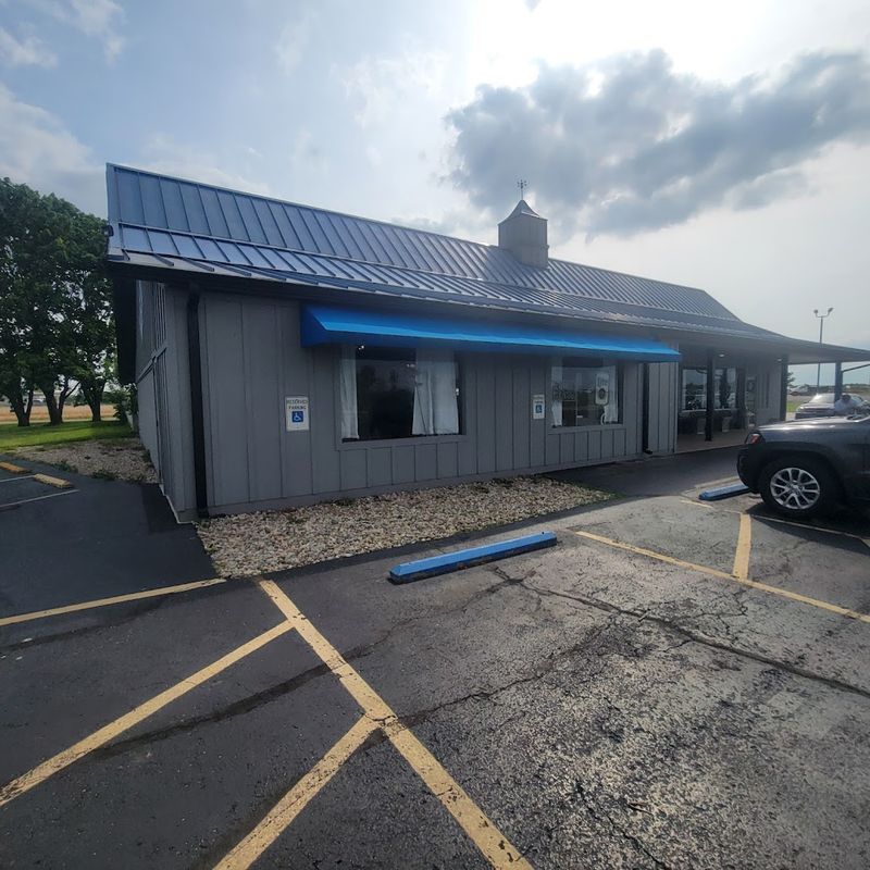 A Warm Hello On A Quiet Small-Town Street