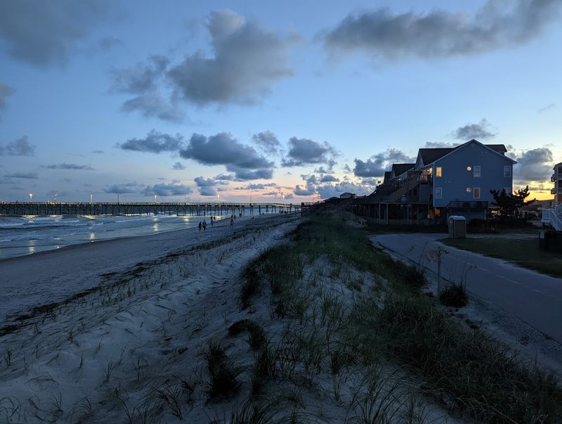 Pastel Cottages Lining Sandy Lanes