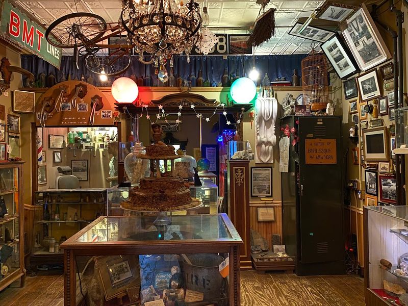 A Red Yellow And Blue Bodega Canopy Over The Door