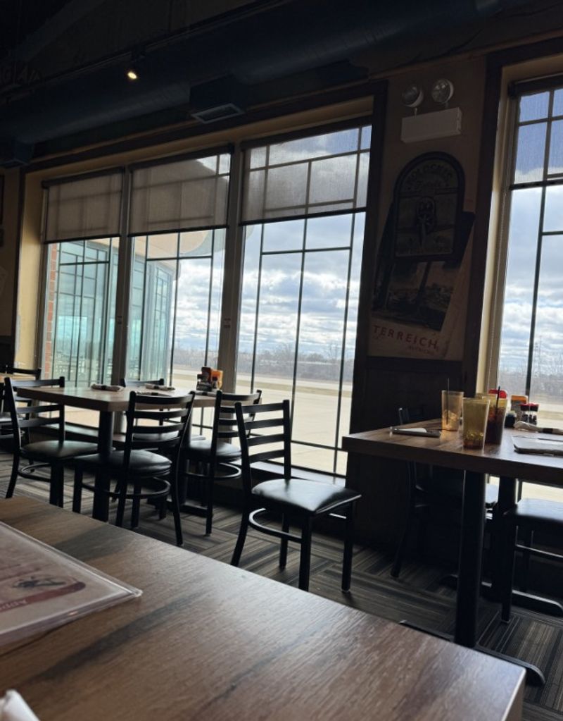 A Restaurant Inside A Working Airport Terminal