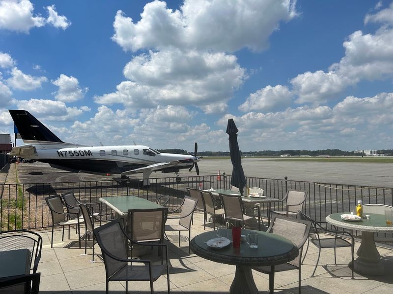 A Small Strip Mall Spot Tucked Beside The Runway