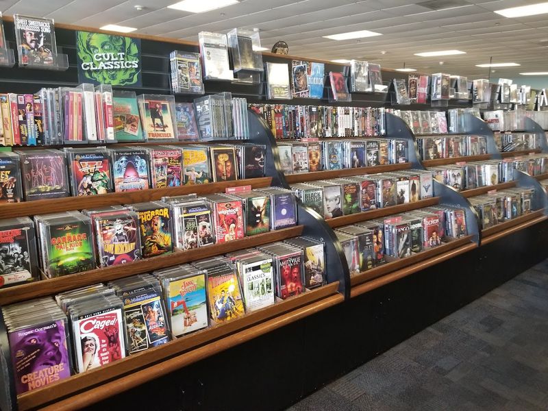 Rows Of Vinyl Records And Vintage Video Games