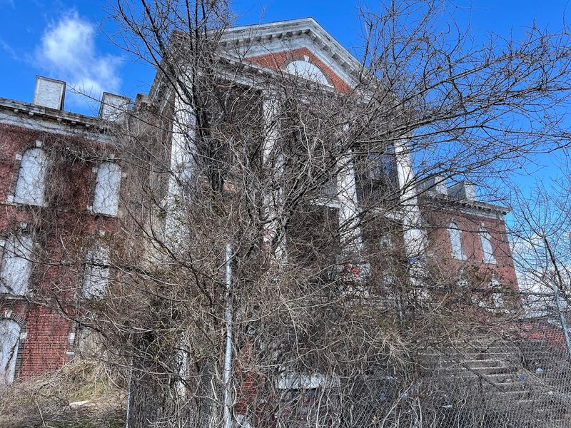 A Dark Past Built Into Every Brick