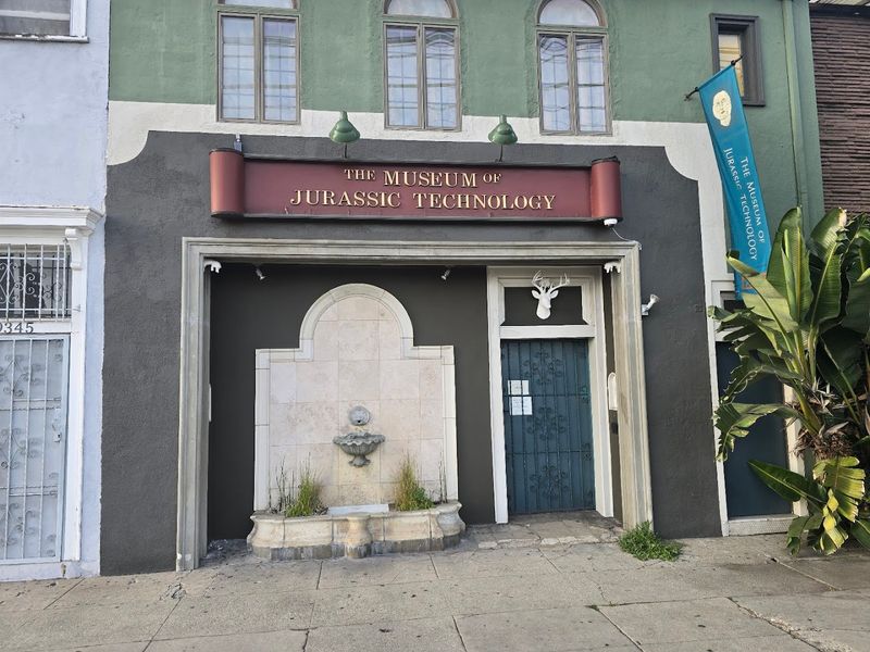 A Burgundy Sign On A Quiet Street