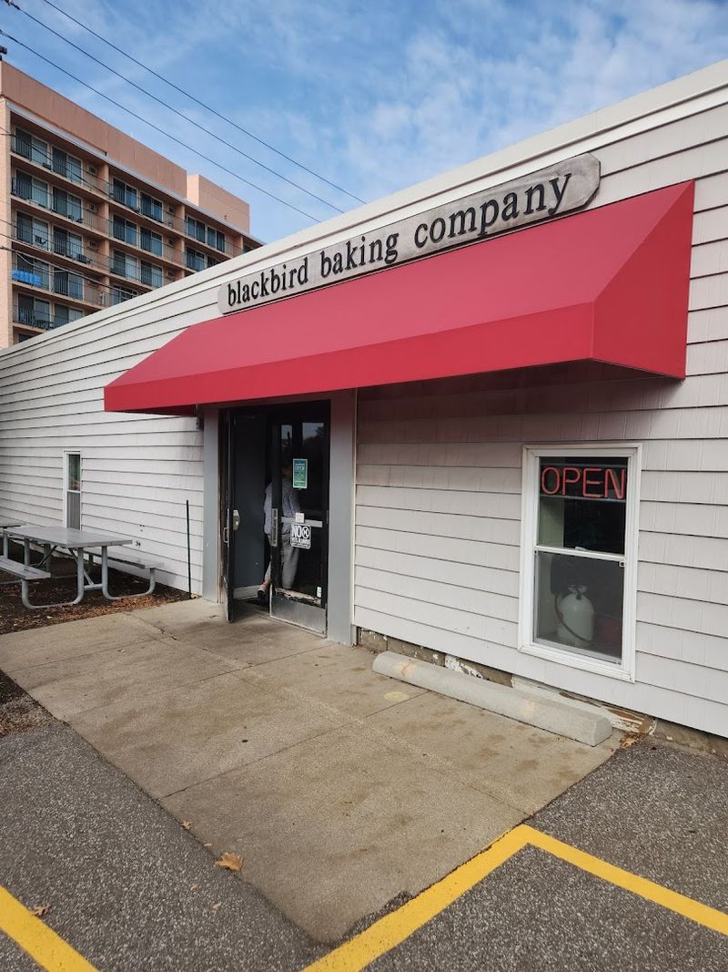 The Bright Red Awning On Sloane Avenue