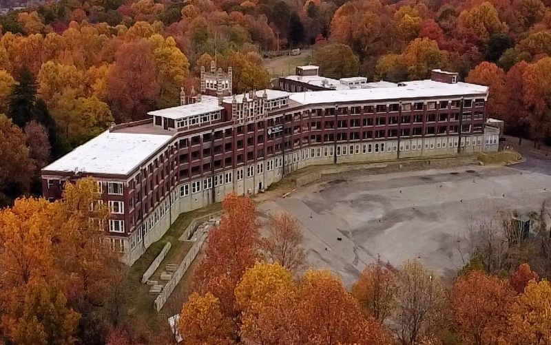 A Towering Gothic Silhouette Above The Louisville Hills