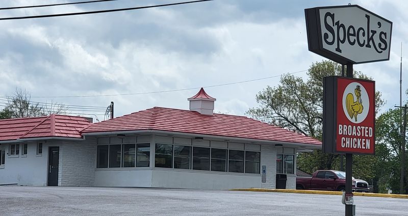 A White Building With A Cherry Red Roof On Route 29