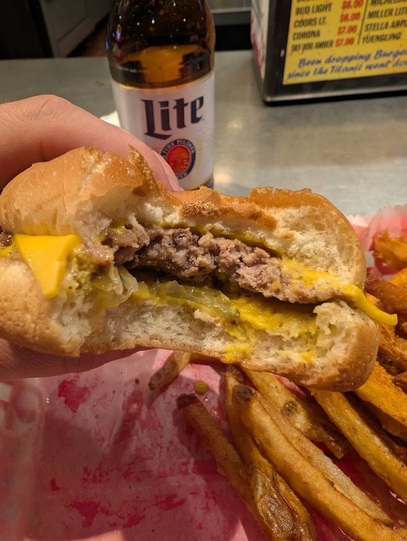 Cheeseburgers Made In Legendary Grease Lead The Hype