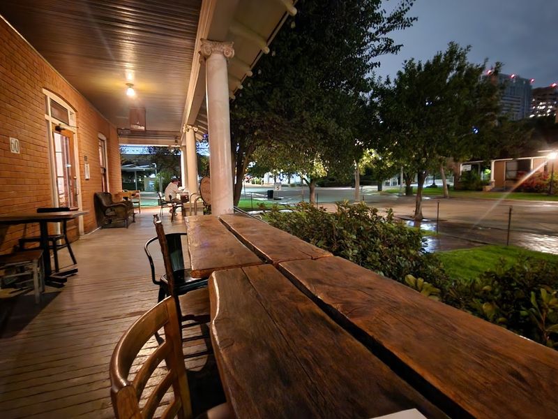 A Cozy 42 Seat Room With Warm Hued Walls