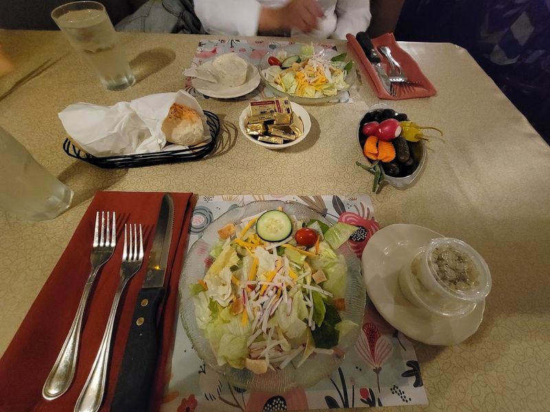 A Relish Tray And Bread Basket At Every Table