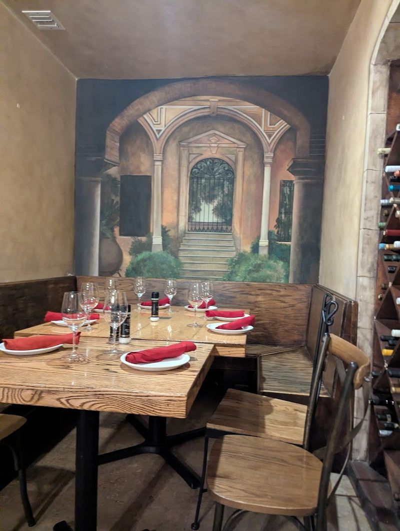 Painted Spanish Scenes And Wrought Iron Chairs