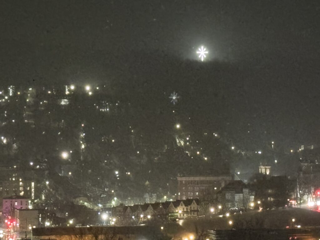 The Star of Bethlehem glowing over the town is a Moravian Star seen 30 miles away.