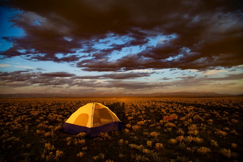 Camping Near The Reservoir Under A Desert Sky
