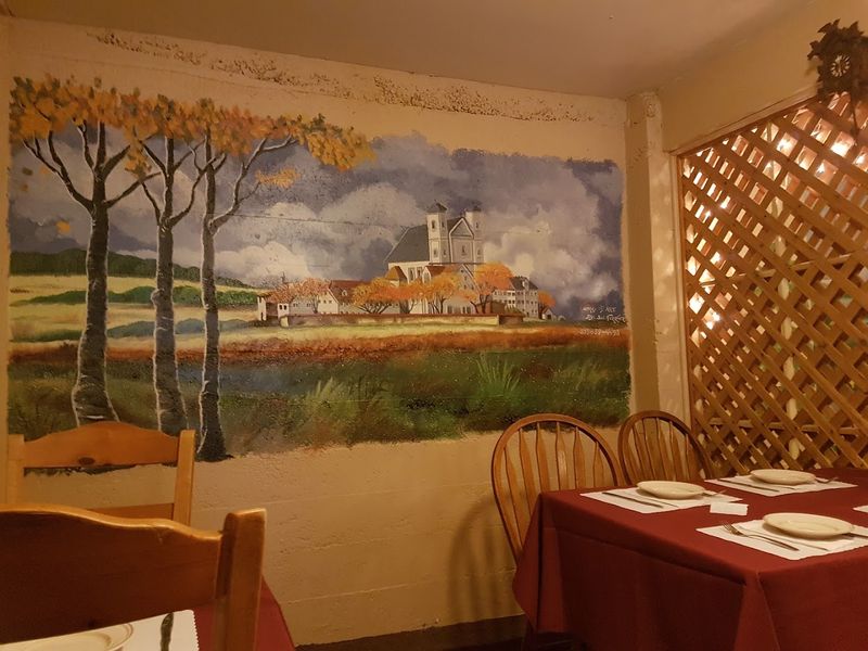 Hand-Painted Murals and Old-World Decor Inside