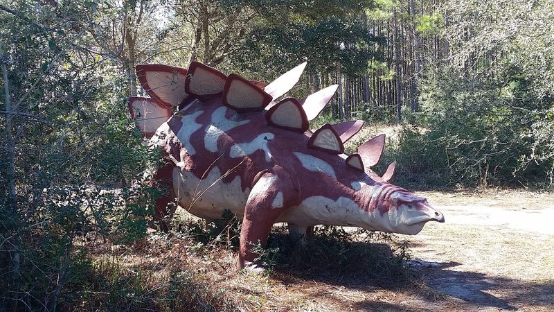 Life-Sized Dinosaurs Hidden Among the Trees