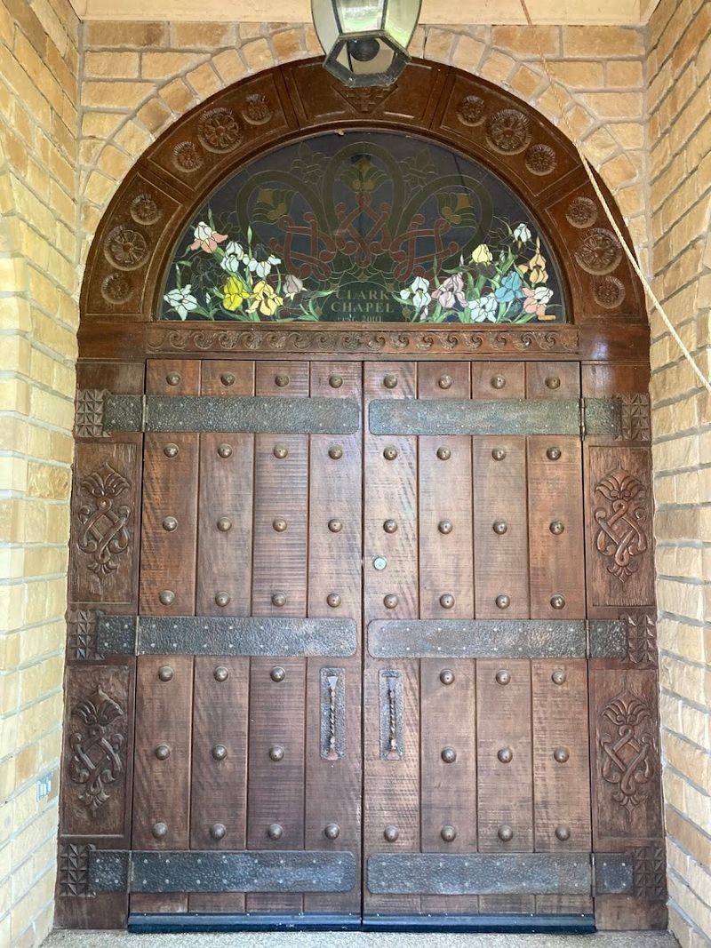 The Sandstone Chapel Nestled Among the Blooms